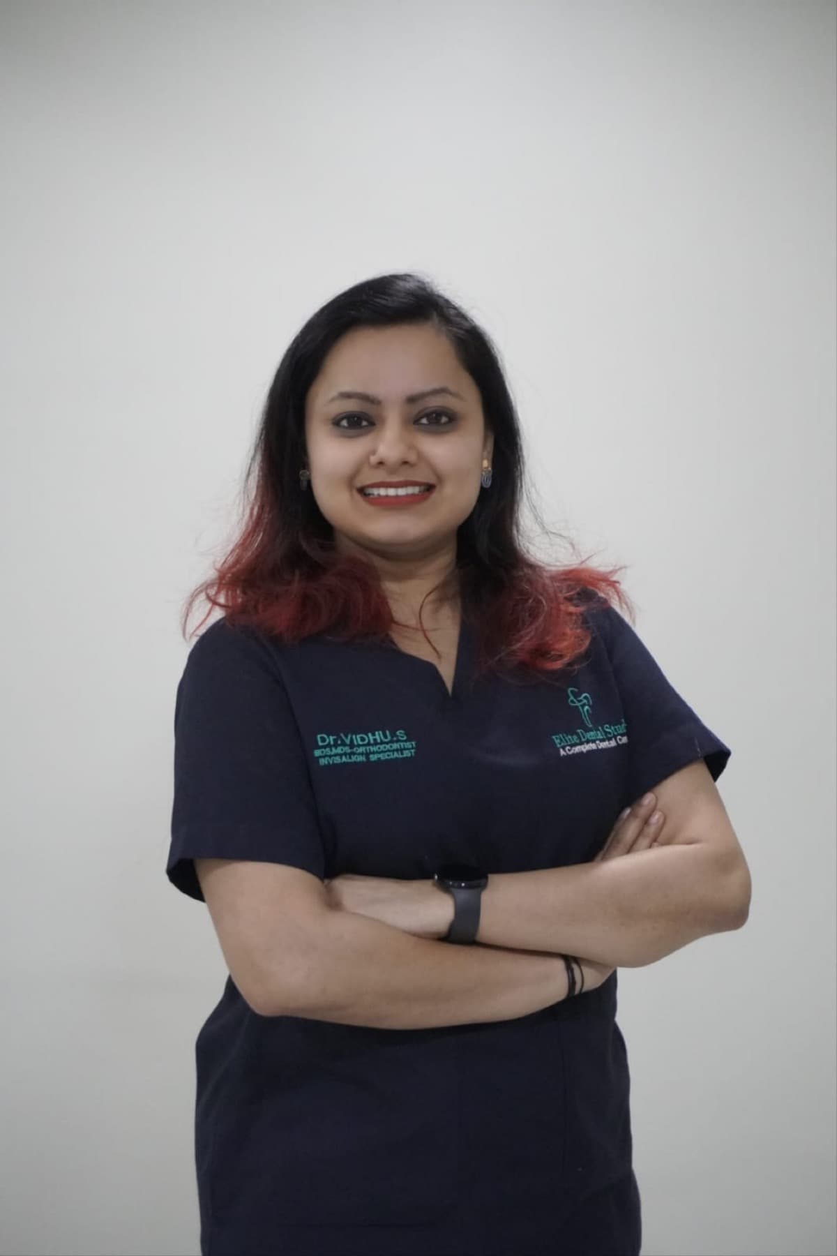 Dr Vidhu S